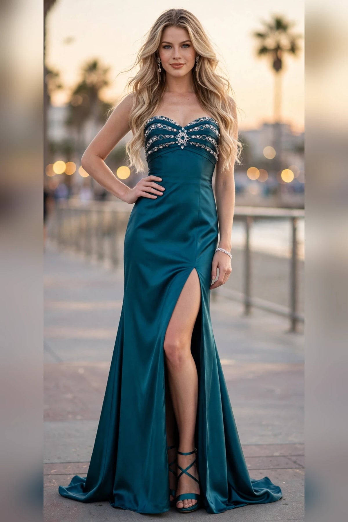 Peacock strapless sweetheart beaded satin gown with crystal medallion and high slit, front view | PromGirlOutlet