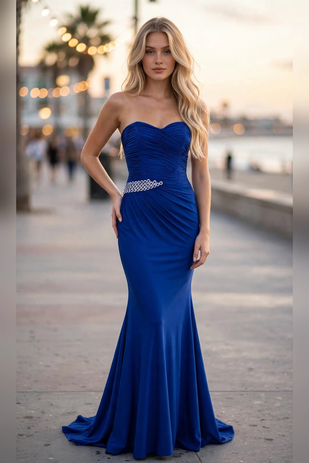 Royal blue strapless ruched mermaid prom dress with beaded waistband, front view | PromGirlOutlet