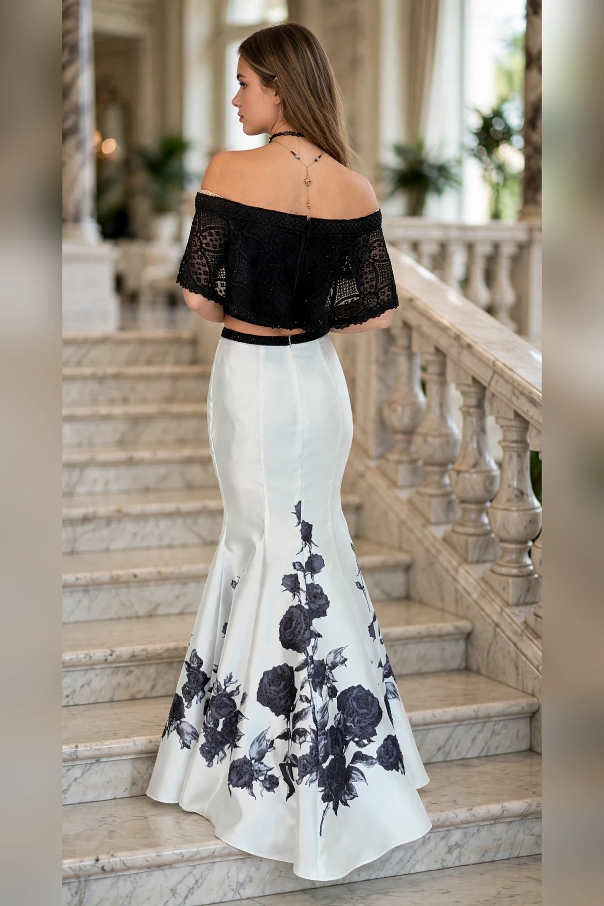 Black and white two-piece prom dress with off-shoulder lace top and rose print skirt, back view | PromGirlOutlet