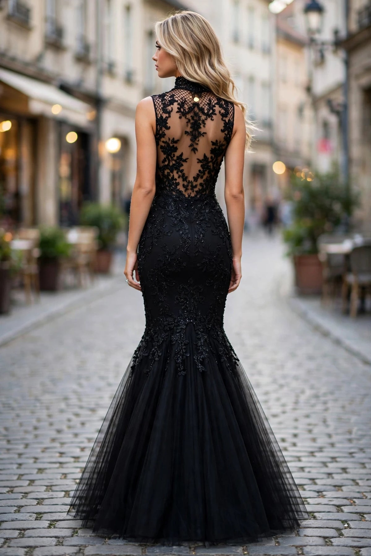 Black beaded illusion high-neck mermaid gown, back view | PromGirlOutlet